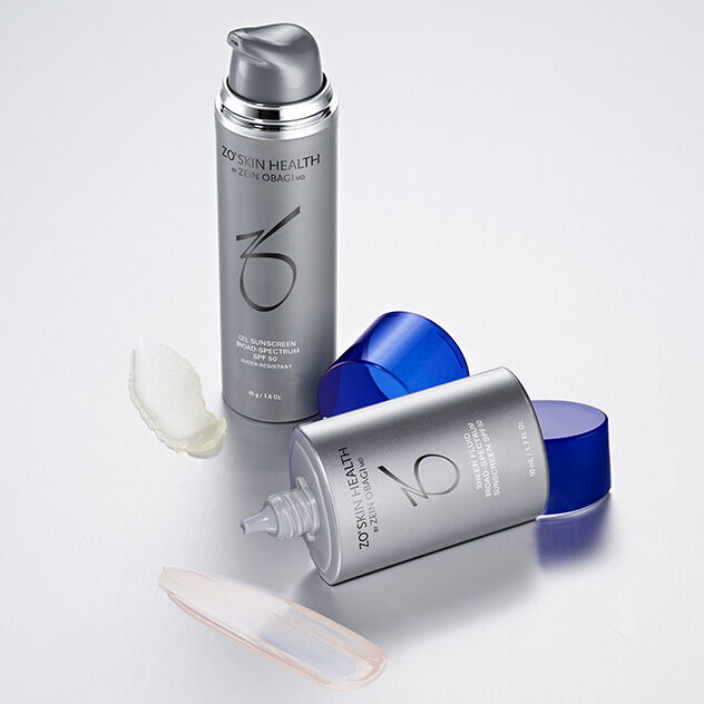 Sheer Fluid and Gel Sunscreens with swatches on white background