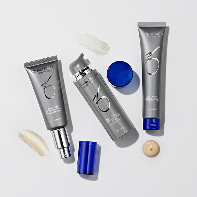 Group shot of chemical sunscreens on grey background