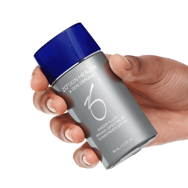GIF of model applying Sheer Fluid SPF 50